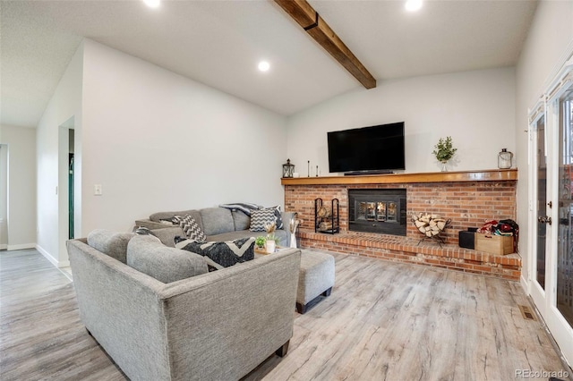 living area featuring a brick fireplace, recessed lighting, baseboards, vaulted ceiling with beams, and wood finished floors