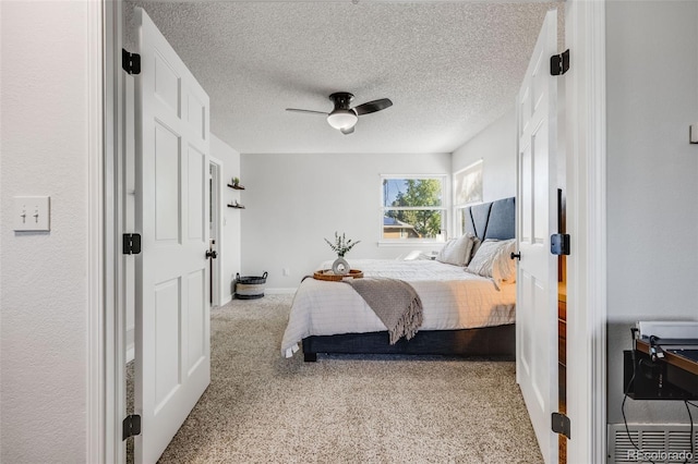 14867 E Pacific Pl, Aurora, CO 80014 - carpeted bedroom with baseboards, a ceiling fan, and a textured ceiling