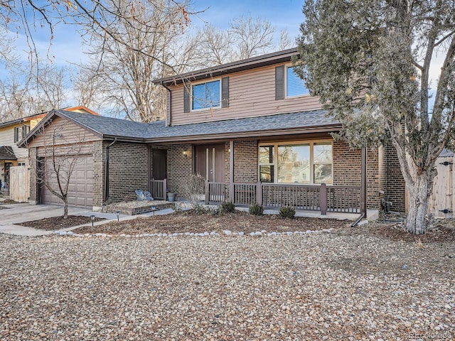 view of front of home with a garage and covered porch