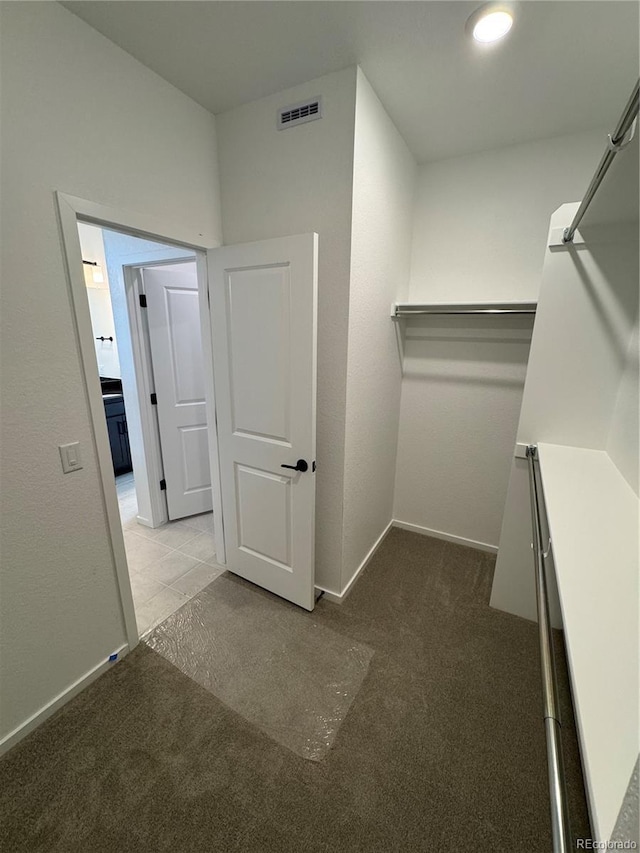 2141 S Irvington St, Aurora, CO 80018 - spacious closet featuring carpet floors