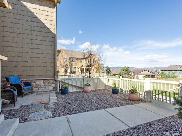 3893 Ute Mountain Trl, Castle Rock, CO 80109 - view of patio / terrace with fence and a residential view