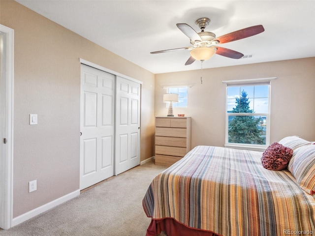 3893 Ute Mountain Trl, Castle Rock, CO 80109 - bedroom featuring baseboards, a ceiling fan, a closet, and light colored carpet
