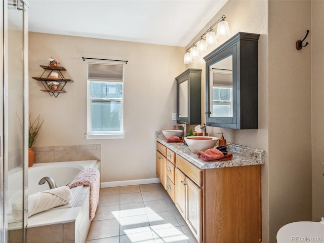 3893 Ute Mountain Trl, Castle Rock, CO 80109 - full bathroom featuring a sink, tile patterned floors, and a wealth of natural light