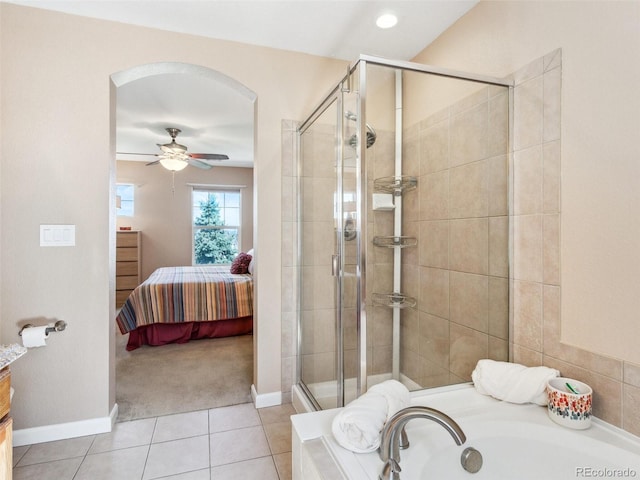 3893 Ute Mountain Trl, Castle Rock, CO 80109 - ensuite bathroom featuring tile patterned floors, ensuite bathroom, a stall shower, and a bath