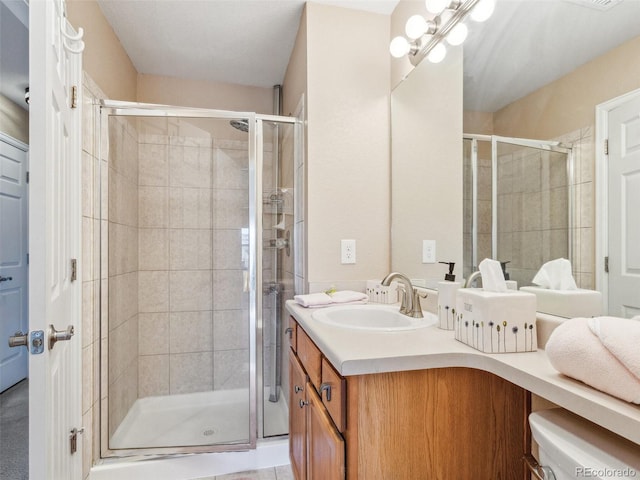 3893 Ute Mountain Trl, Castle Rock, CO 80109 - bathroom featuring vanity and a shower stall