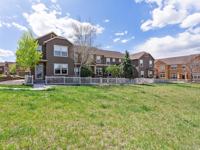 3893 Ute Mountain Trl, Castle Rock, CO 80109 - rear view of property with a lawn, fence, and a residential view