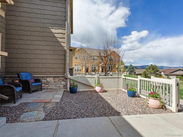 3893 Ute Mountain Trl, Castle Rock, CO 80109 - view of patio with fence and a residential view