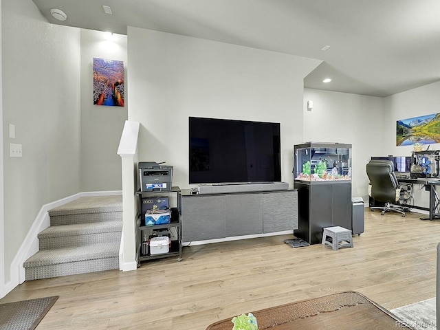 4245 E Iliff Ave Unit 2, Denver, CO 80222 - living area with recessed lighting, wood finished floors, baseboards, and stairway