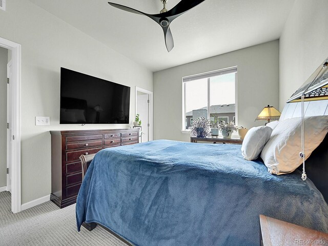 4245 E Iliff Ave Unit 2, Denver, CO 80222 - bedroom with light carpet, baseboards, and ceiling fan