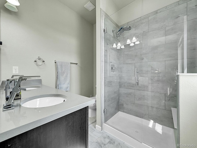 4245 E Iliff Ave Unit 2, Denver, CO 80222 - bathroom featuring a shower stall, visible vents, and toilet