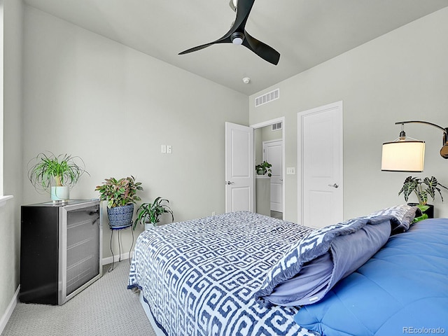 4245 E Iliff Ave Unit 2, Denver, CO 80222 - bedroom with baseboards, visible vents, and carpet