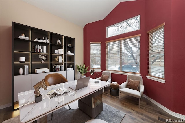 office featuring wood-type flooring and vaulted ceiling