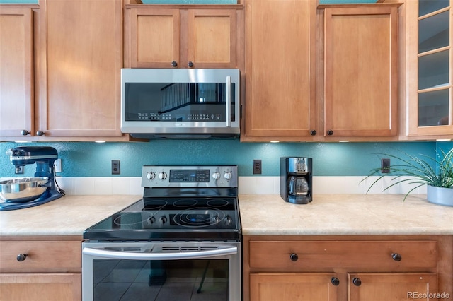 kitchen with appliances with stainless steel finishes