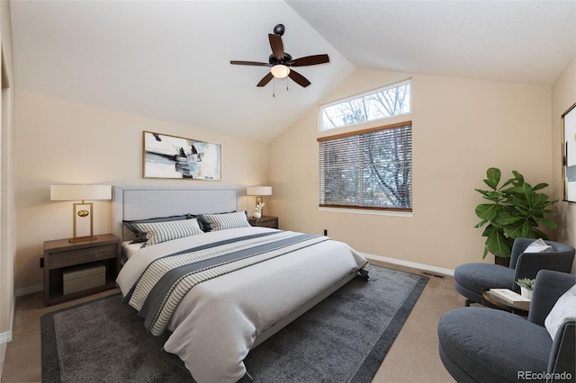 carpeted bedroom with ceiling fan and lofted ceiling