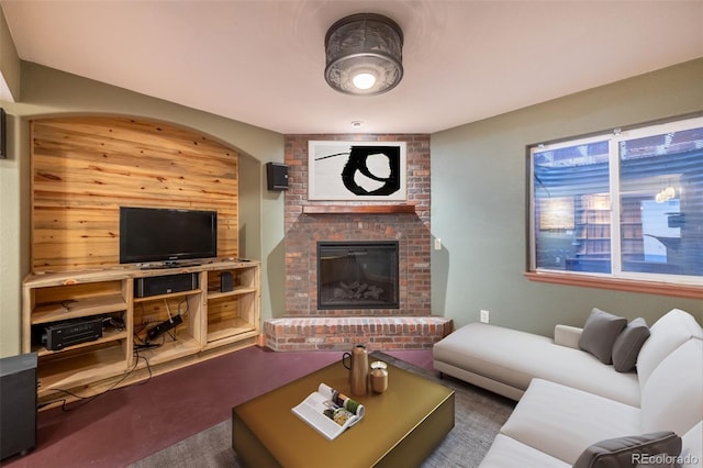 living room featuring a fireplace