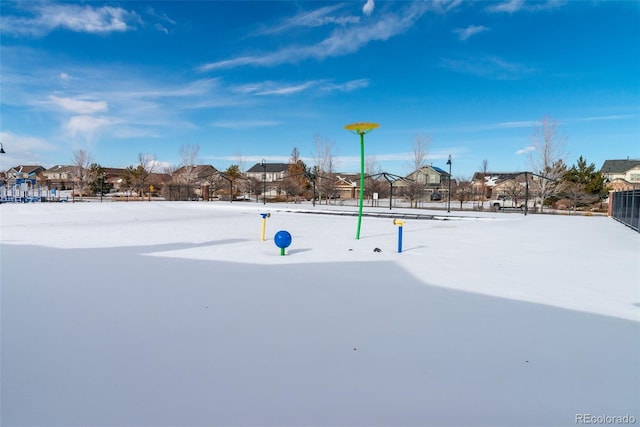 view of yard layered in snow