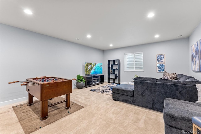 game room featuring light colored carpet