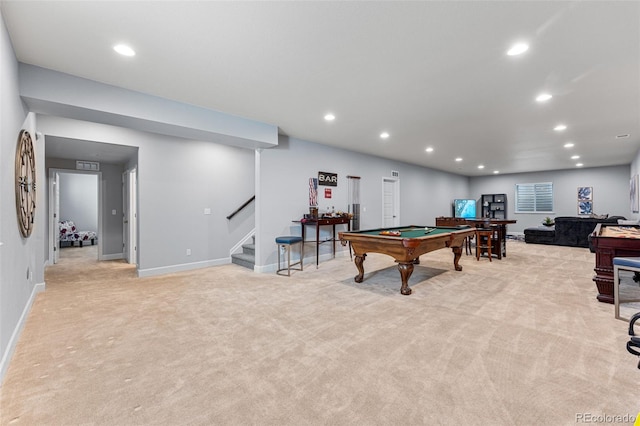 game room with pool table and light colored carpet