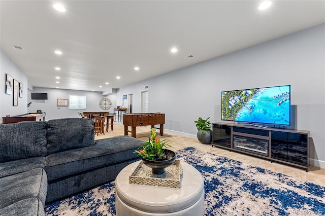 living room featuring light colored carpet