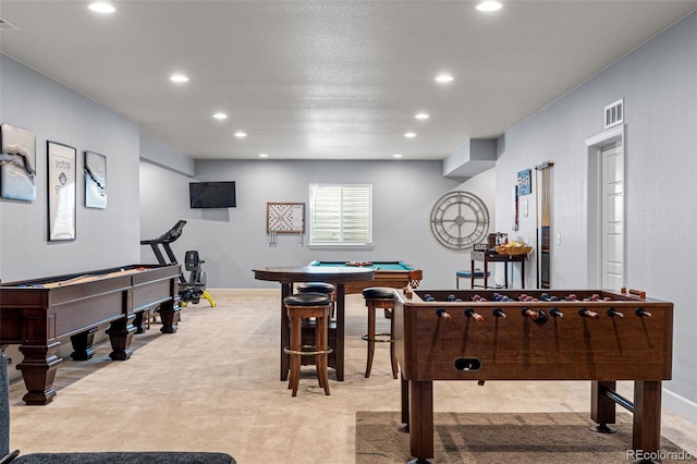 playroom featuring pool table and light carpet