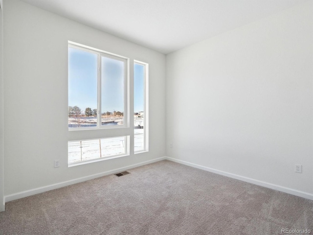 empty room with carpet floors