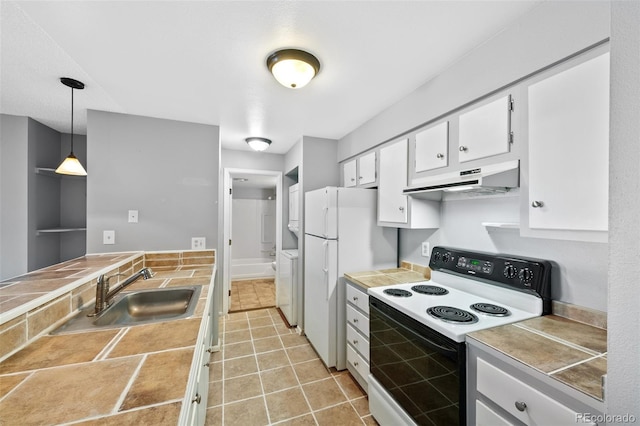 kitchen featuring white cabinets, pendant lighting, white appliances, and sink