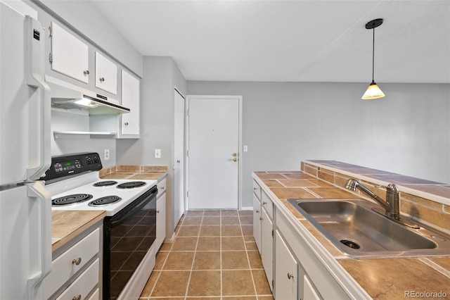 kitchen with sink, tile patterned flooring, pendant lighting, white appliances, and white cabinets