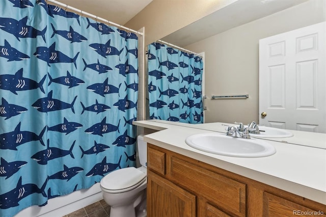 full bathroom with tile patterned floors, vanity, toilet, and shower / bath combo with shower curtain