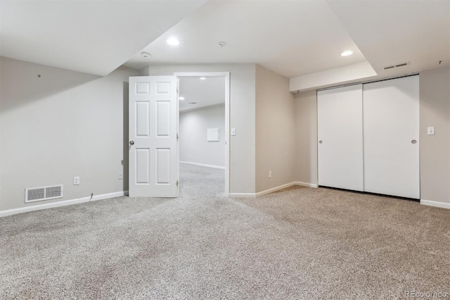 basement with carpet flooring