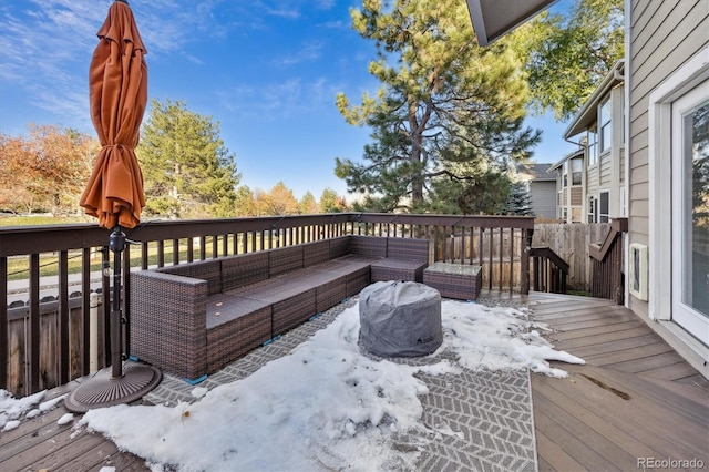 deck featuring outdoor lounge area