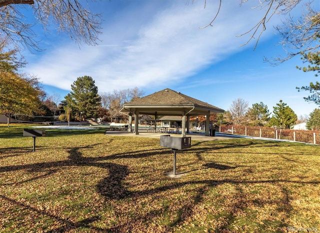 view of home's community with a gazebo and a yard