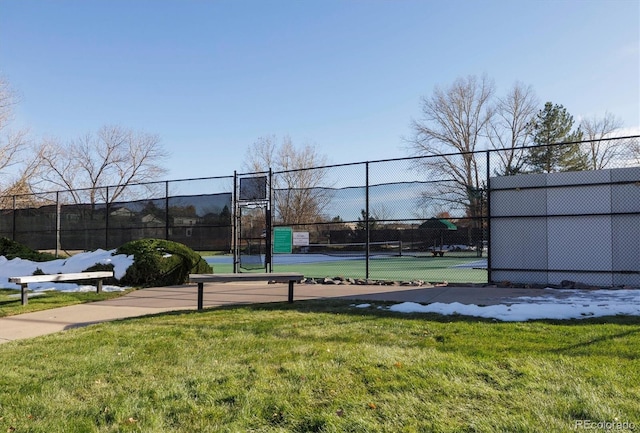 view of sport court with a yard and tennis court