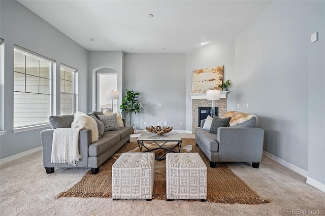 6013 Eldora St, Golden, CO 80403 - carpeted living area featuring baseboards and a glass covered fireplace
