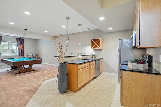 6013 Eldora St, Golden, CO 80403 - kitchen with appliances with stainless steel finishes, recessed lighting, light carpet, billiards, and a peninsula