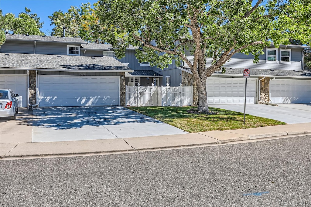 front of property with a garage