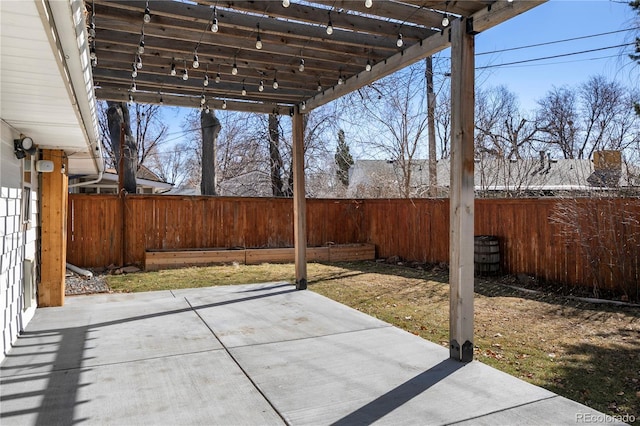 view of patio with a fenced backyard and a pergola