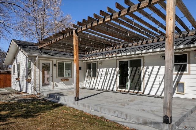 exterior space featuring a patio area and a pergola