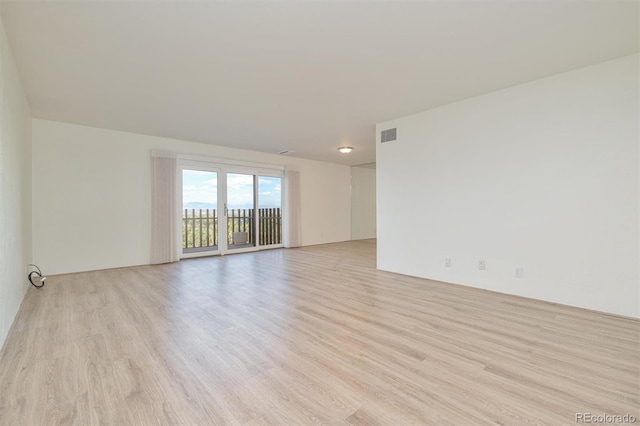 460 S Marion Pkwy Unit 1103, Denver, CO 80209 - empty room with light wood-style flooring