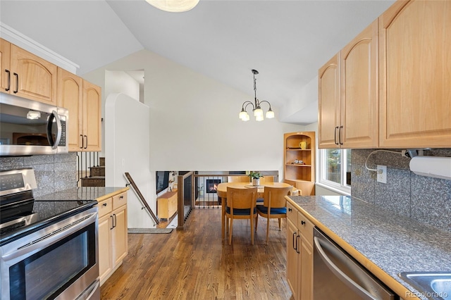 11035 E Berry Ave, Englewood, CO 80111 - kitchen with stainless steel appliances, light brown cabinetry, vaulted ceiling, tile counters, and dark wood finished floors