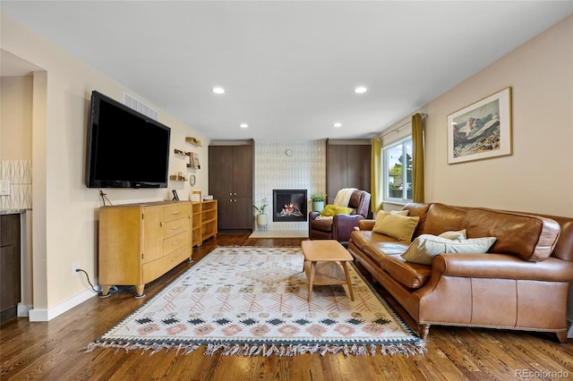 11035 E Berry Ave, Englewood, CO 80111 - living area with a fireplace, dark wood-type flooring, and recessed lighting