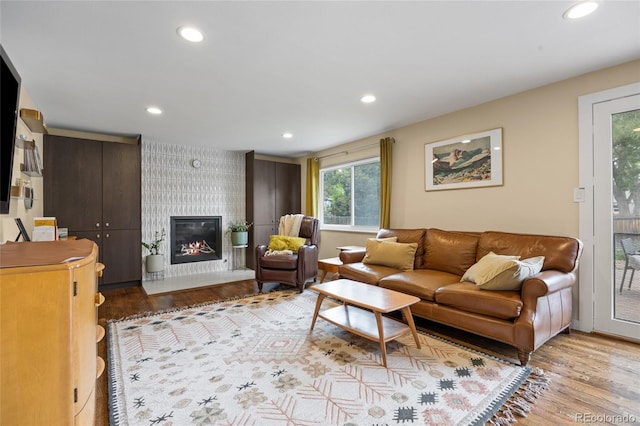 11035 E Berry Ave, Englewood, CO 80111 - living room with wood finished floors, recessed lighting, and a fireplace