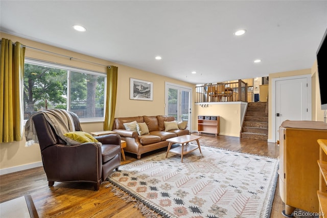 11035 E Berry Ave, Englewood, CO 80111 - living room with plenty of natural light, stairs, recessed lighting, and wood finished floors