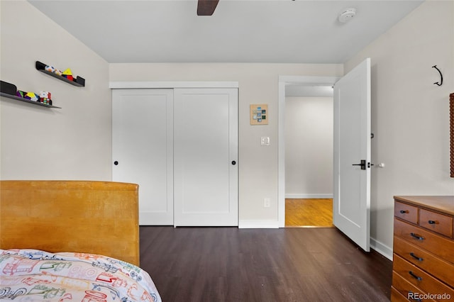 11035 E Berry Ave, Englewood, CO 80111 - bedroom featuring dark wood-style flooring, a closet, and ceiling fan