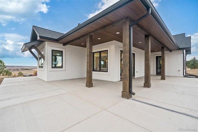 rear view of property with a patio area