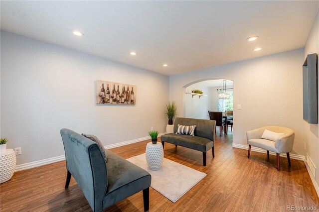 sitting room featuring hardwood / wood-style floors