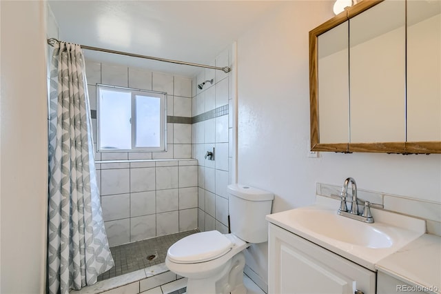 full bath with toilet, a shower stall, and vanity