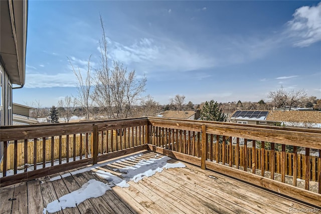 view of snow covered deck