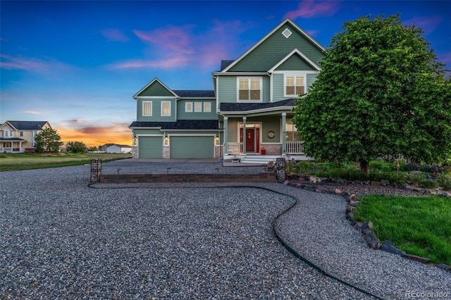 881 Kirby Ct, Watkins, CO 80137 - craftsman-style house with a porch, a garage, and driveway