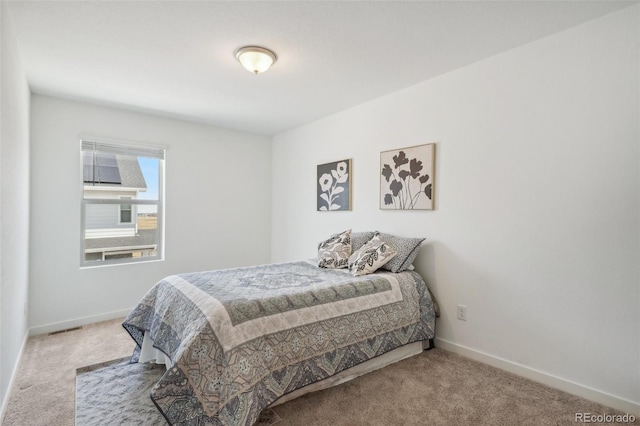 27593 E 1st Pl, Aurora, CO 80018 - carpeted bedroom with baseboards