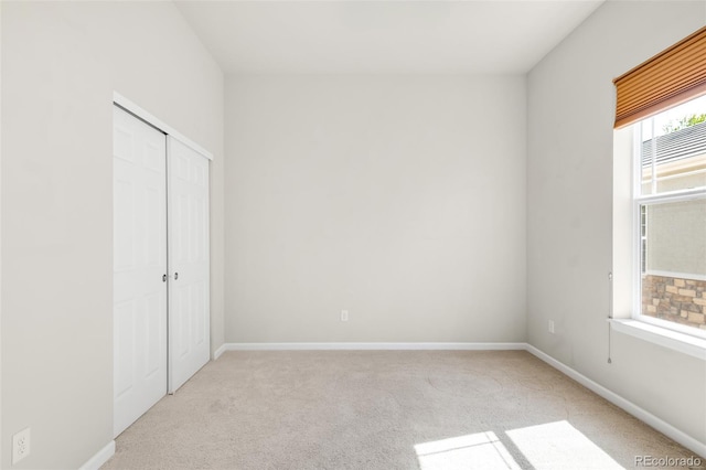 4519 Silver Mountain Loop, Broomfield, CO 80023 - unfurnished bedroom featuring carpet flooring, a closet, and baseboards